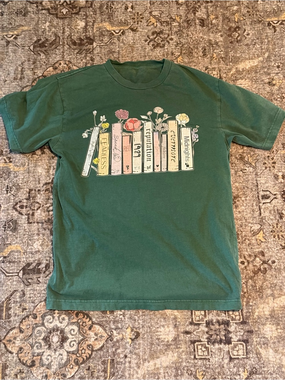 📚 Women’s Taylor Swift Swifties Albums as Books on Bookshelf Green Graphic Tee